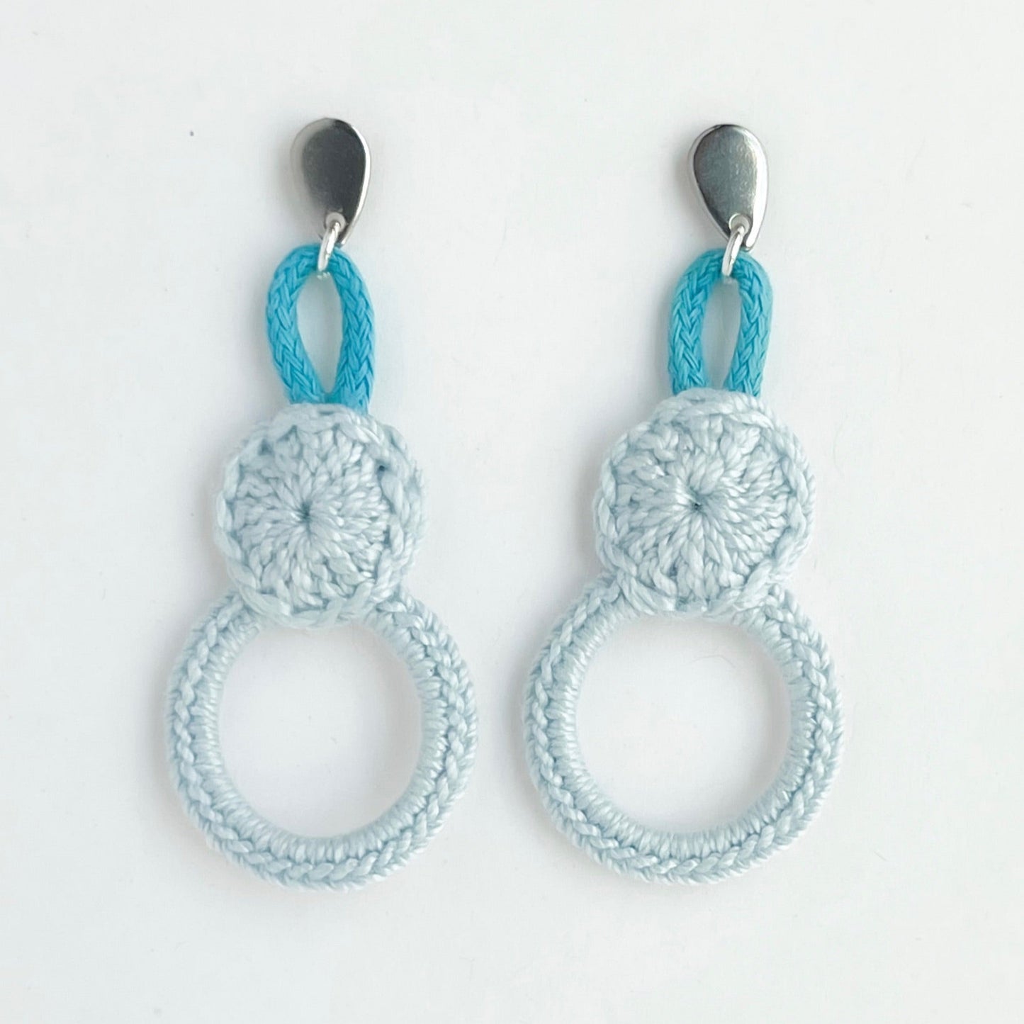 Light blue crochet earrings, modern minimalist style