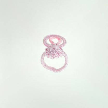 Front-facing view of the Blossom crochet ring in rose, featuring its elegant handmade design and comfortable fit.