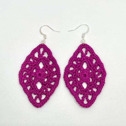 Handmade boysenberry color crochet lace earrings with silver accents, adding a touch of elegance to any outfit. French hook ear wire.