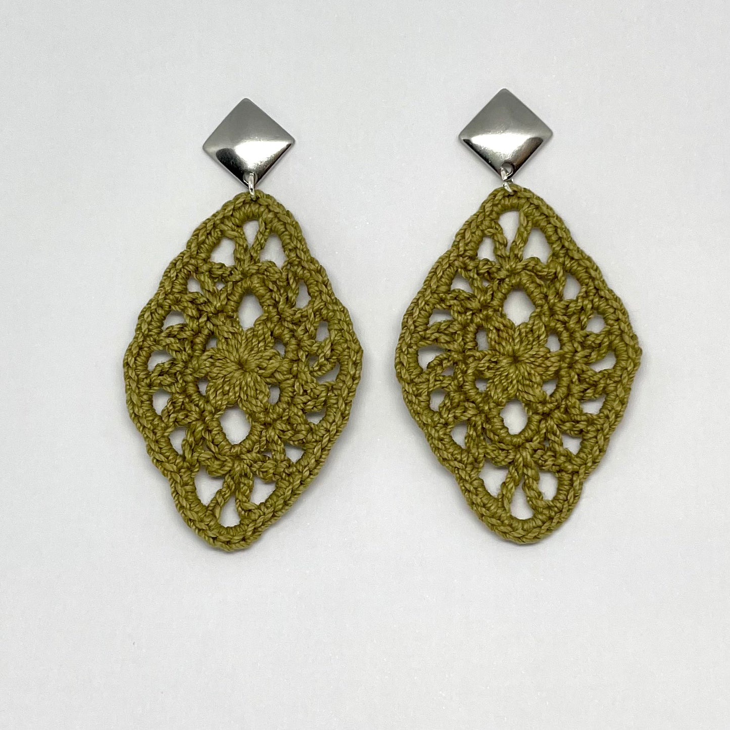 Handmade moss color crochet lace earrings with silver accents, adding a touch of elegance to any outfit.  Square Post Earrings.