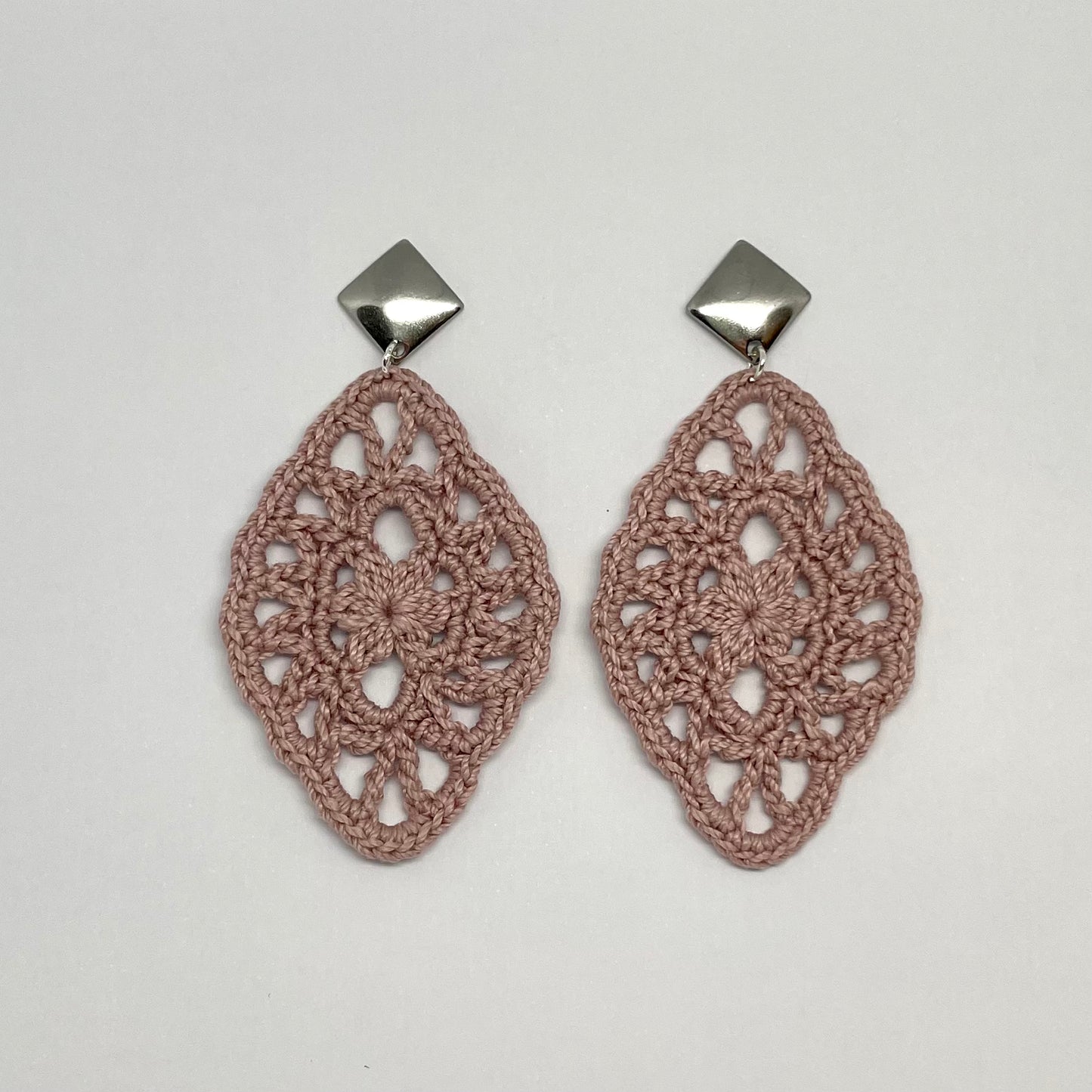 Handmade antique color crochet lace earrings with silver accents, adding a touch of elegance to any outfit.  Square Post Earrings.