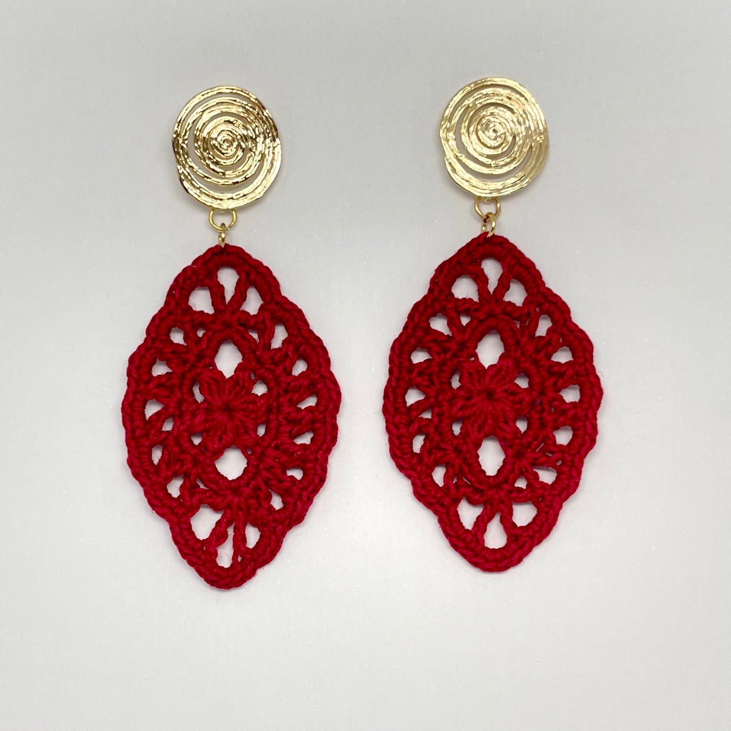 Elegant red crochet lace earrings with gold finished round post earrings.