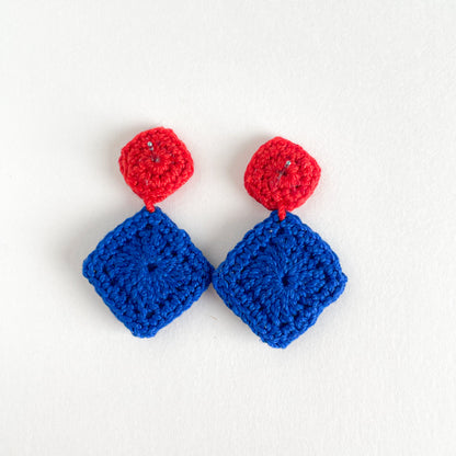 Back view of the Tessera crocheted earrings blue and red  on a white background