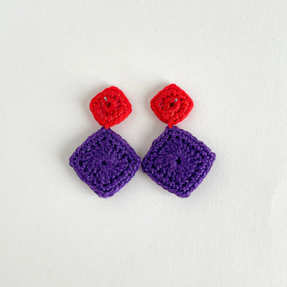 Back view of the Tessera crochet earrings with red tops and purple squares on a white background by Crochet by Heart.